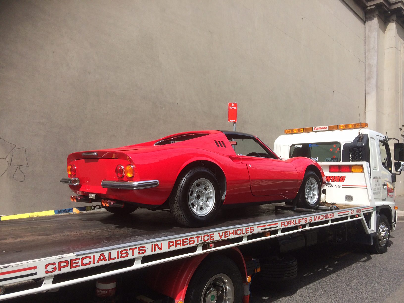 luxury red ferrari Car towing